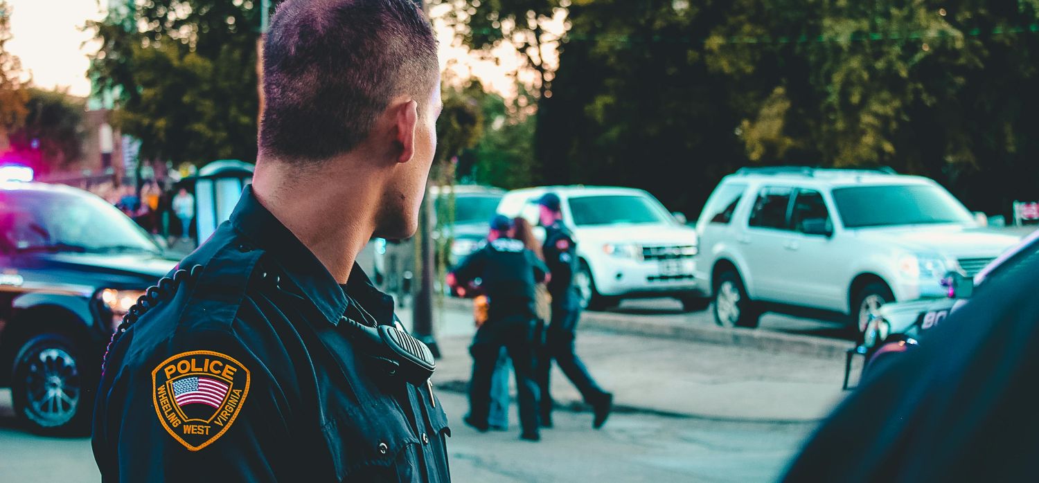 Police write a report at an accident scene in New Mexico